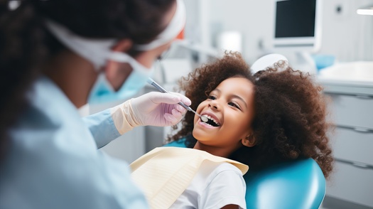 The University of Illinois-Chicago recommends children use a straw to help reduce the contact of sweetened beverages with teeth. (Adobe Stock)