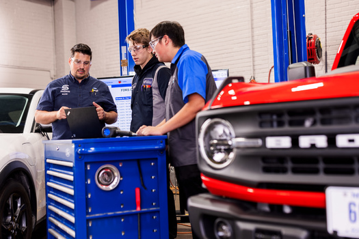 Southeast Community College Ford ASSET instructor Mark Berggren with students. (Photo courtesy of Southeast Community College)