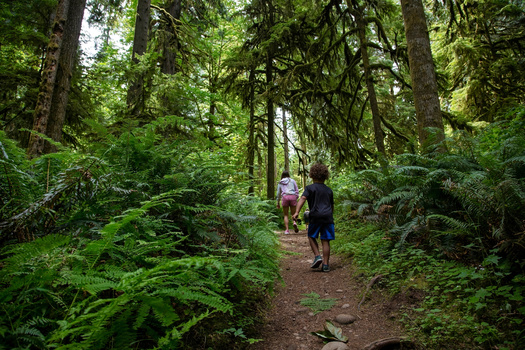 Organizations helping underserved youth get outdoors can receive up to $150,000 in grant funding from Washington state. (Brocreative/Adobe Stock)