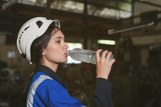 A draft rule would require Maryland employers to provide at least 32 ounces of water per hour to each employee exposed to heat stress conditions, every workday. (Adobe Stock)