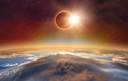 According to the eco-sustainability site Treehugger.com, if someone was standing on the moon during a total eclipse, the earth would look dark because the sun would be behind it. (Adobe Stock)