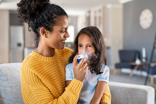 According to the American Lung Association, children face special risks from air pollution because their airways are small and still developing, and because they breathe more rapidly and inhale more air relative to their size than do adults. (Adobe Stock)