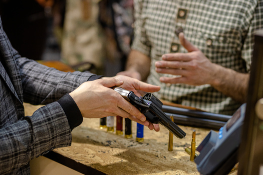 Straw purchases for guns are already a felony under federal law, but Minnesota lawmakers are expressing the need to do the same under state law following the recent fatal shooting of three first responders in a Twin Cities suburb. (Adobe Stock)