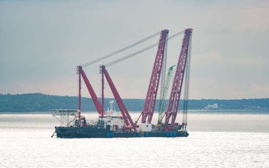 Salvage cranes from up and down the eastern seaboard have relocated to Baltimore. (Adobe Stock)