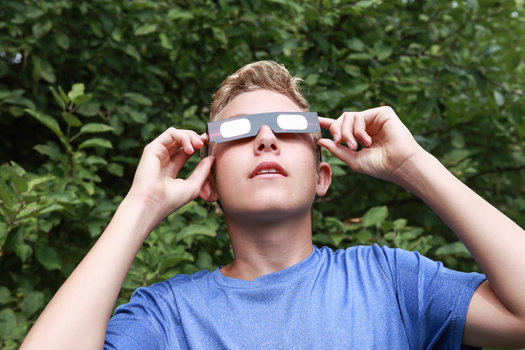 The New Hampshire Space Grant and the University of New Hampshire have distributed 33,000 pairs of eclipse glasses to students, teachers, firefighters and police in anticipation of today's total solar eclipse. (Adobe Stock)