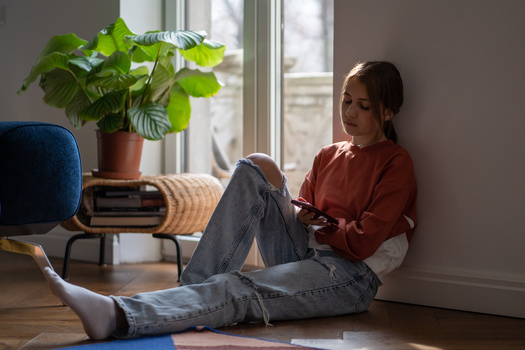 Among teens using social media, 54% said it would be at least somewhat hard to give up, while 46% said it would be somewhat easy, according to the Pew Research Center. (Adobe Stock)