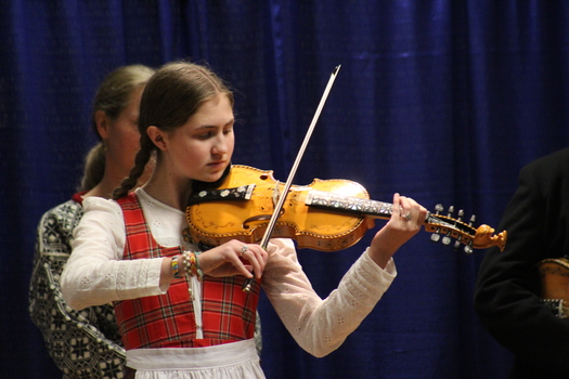 Elsa-Ruth Pryor plays a Hardanger fiddle that she made during a wintertime concert in the Fargo area. (Photo courtesy Gabby Clavo)