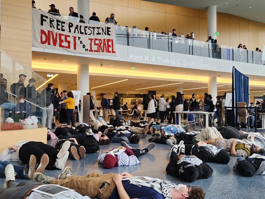 Ohio students participate in a die-in at Case Western University on April 19 in protest over what they say is an ongoing genocide of Palestinians in Gaza. (Adobe Stock)