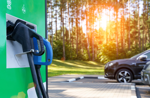 Calls for building out vast electric-vehicle charging networks have become a thorny issue in oil-producing states such as North Dakota. But EV owners say elected leaders need to realize some automakers are still making a strong push, despite their opposition. (Adobe Stock)