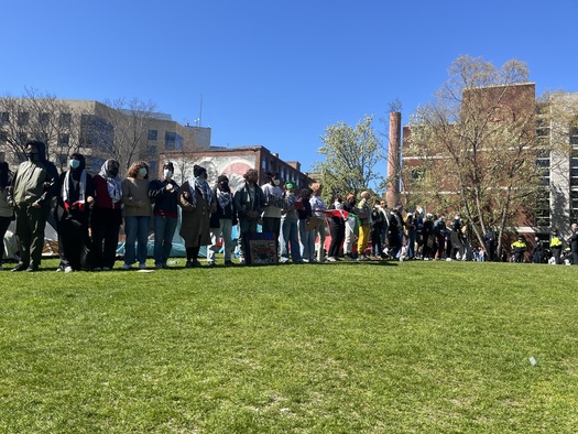 Students and faculty at Northeastern University in Boston surround a pro-Palestinian encampment on their school's campus, which stood for two days before administrators called in police to remove it. (Ehn)