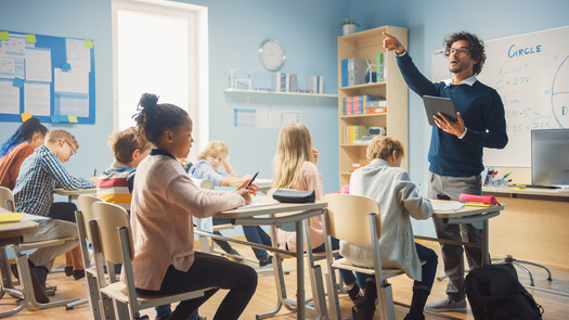 A recent survey commissioned by EdWeek Research Center found on average, teachers said they thought they realistically deserved a 31% raise. (Adobe Stock)