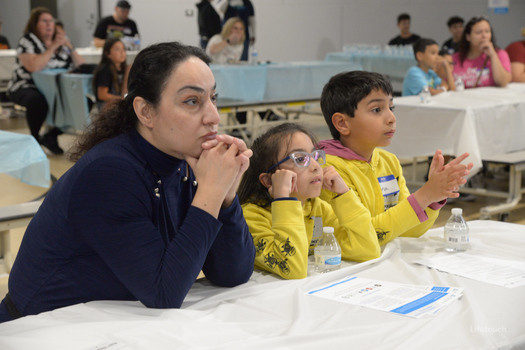 Families at Luiseno Elementary School in Corona listen to a recent workshop featuring the Ready, Tech, Go program. (Lifetouch)