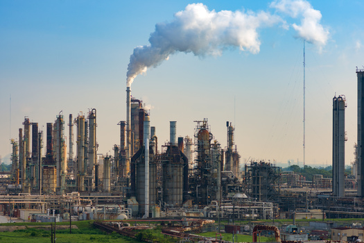 Industrial emissions of carcinogenic chemicals disproportionately occur in neighborhoods where African American, Hispanic, Latino residents, including many living in poverty. (Oleksii Fadieiev/Adobe Stock)
