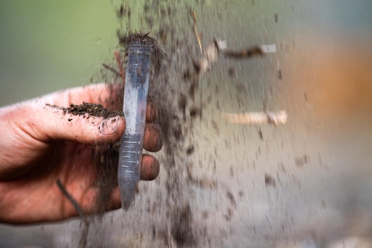 Scientists at Iowa State University are creating biochar to mix with Iowa's rich soil to sequester carbon, create prime growing conditions for crops and soak up climate-warming fossil fuel emissions. (Adobe Stock)
