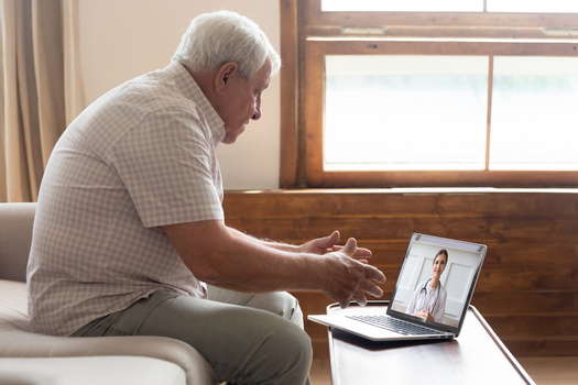 An AARP survey found only 9% of adults age 50 and older would not consider a telehealth visit over an in-person one under any circumstance. (Adobe Stock)