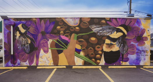 Ohio artist Kenia Lamarr created a mural for the rusty-patched bumblebee, the first native bee on the U.S. Fish and Wildlife Service's endangered species list. (Kenia Lamarr)