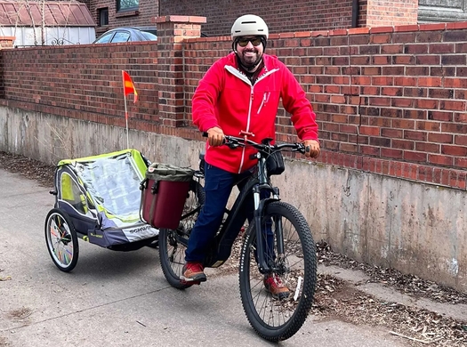 Denver resident Jeff Gonzales often finds e-biking to work quicker but said even when the ride does not save time, it is more enjoyable. 