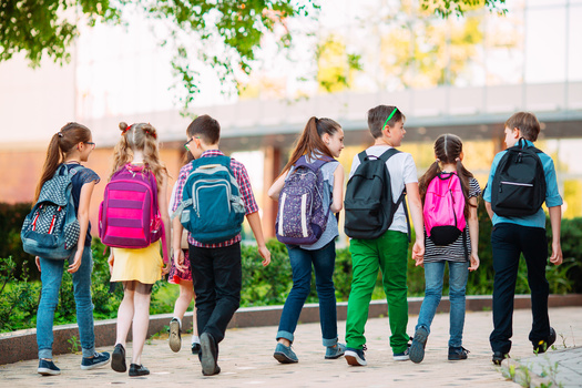 Staff - in addition to teachers - are needed to ensure schools run, but these workers are often paid low wages. (davit85/Adobe Stock)