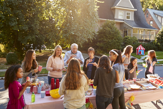 In North Dakota and elsewhere, various nonprofits are trying to take block parties and similar events to another level with activities that emphasize physical movement and other forms of engagement, so that all community members have access to a healthier lifestyle. (Adobe Stock)