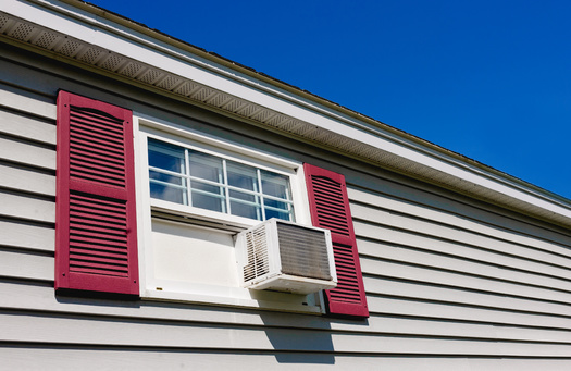 A dirty air filter can keep air conditioners from running optimally. (Kevin Brine/Adobe Stock)