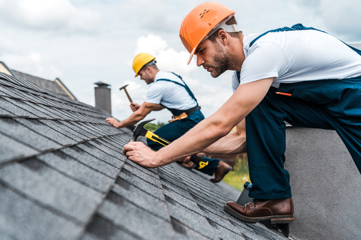 Minnesota officials say a new roofing standard, created by the Insurance Institute for Business & Home Safety, has shown to reduce the costs of hail and wind-related damages by up to 60%. The standard is now being used for home resiliency programs. (Adobe Stock)