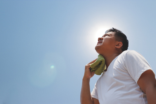Health care providers said if you must be outside during the summer heat drink plenty of water and take multiple breaks. (praewpailyn/Adobe Stock)