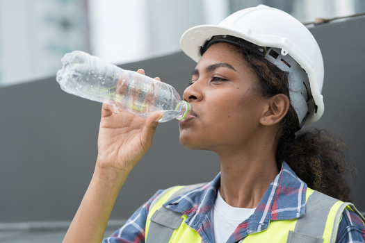 A University of Minnesota expert said drinking enough water helps your muscles work efficiently, a key benefit for those doing outdoor labor during hotter stretches. (Adobe Stock)