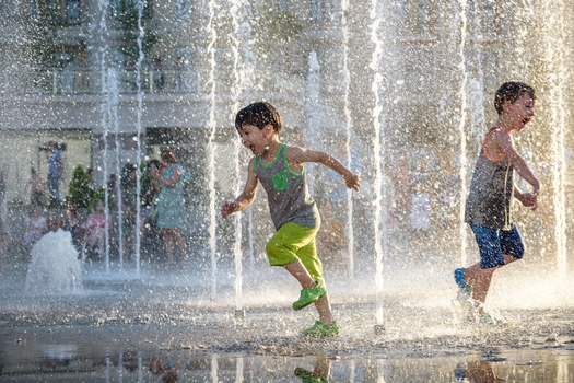 Water parks are a good way to keep cool in the summer, but the Illinois Department of Public Health reminds parents to always supervise children playing in or near the water. (Adobe Stock)
