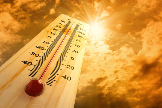 Rising temperatures can cause spikes in emergency-room visits for heat-related issues and workplace injuries. (Adobe Stock)