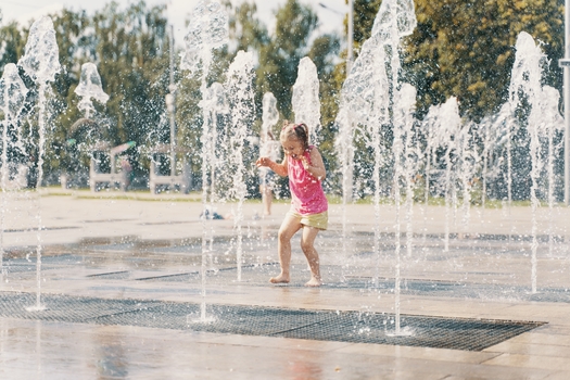 Water parks are a good way to keep cool in the summer but the public health experts reminded parents to always supervise children playing in or near the water. (Adobe Stock)