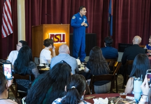 Former NASA astronaut Jose Hernandez delivers his inspirational life story to students whose family members are seasonal farmworkers at Arizona State's Migratory Student Summer Academy. (Charlie Leight/ASU)