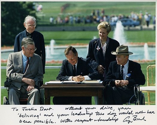 President George H.W. Bush signed the Americans with Disabilities Act on July 26, 1990. (Wikimedia Commons)