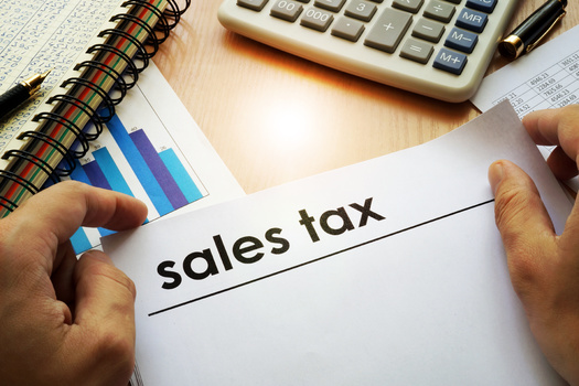 According to the Tax Policy Center, for higher-income earners, sales taxes consume a lower share of their income than for other households. (Vitalii Vodolazskyi/Adobe Stock)