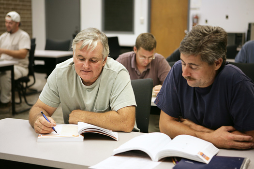 Each Community Action Agency is different, but many offer help with resume building and interview readiness as low-income individuals try to find stable work. (Adobe Stock)
