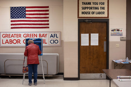 A Wisconsin resident casts a ballot in the state's primary election at a polling location on April 2 in Green Bay. (Photo courtesy of Inside Climate News - Credit Scott Olson/Getty Images)