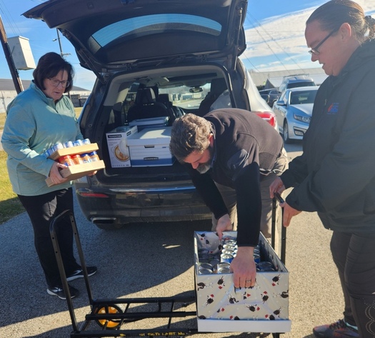 Community Action Kentucky workers helping deliver food. (Community Action Kentucky/Facebook)