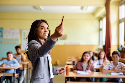 Ohio public schools have about 100,000 teachers, averaging 16 students per teacher and 220,000 non-teaching staff, averaging seven students per non-teaching position, with nearly all teachers holding a bachelor's degree or higher. (Drazen/Adobe Stock)