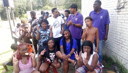 Operation Good works to improve life in Mississippi and recently held a community block party, inviting single moms and their kids to help to curb violence in Jackson. (Photo courtesy of Operation Good)
