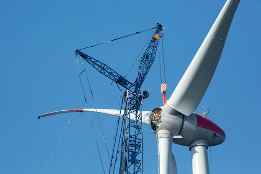Reports show states across New England have to upgrade distribution systems to accommodate a peak load in 2050, which will be double what New England historically experienced. (Adobe Stock)