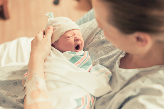 Postpartum anxiety occurs in up to 11% of new mothers. Symptoms include feeling very nervous and  recurring panic attacks. (Adobe Stock) 