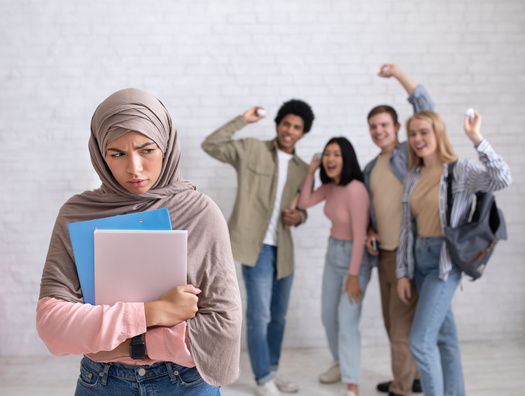 A new report from the Council on American Islamic Relations-New York showed 43% of students who were bullied for being Muslim said they never asked for help. (Adobe Stock)