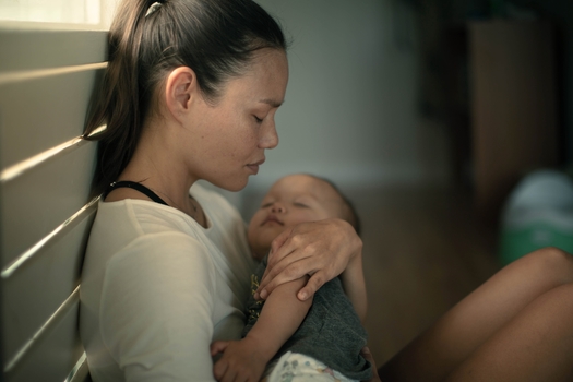 Health care professionals warn that untreated bouts of postpartum depression can lead to serious health consequences, both for the new parent and their child. (Adobe Stock)