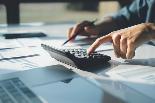 Michael Hicks at Ball State University said over the past two decades, average real wages for manufacturing workers in Indiana dropped by a stunning 14.4%, compared to a 1% rise nationwide. (Adobe stock) 