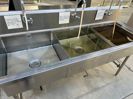 Three sinks show wastewater after it goes through each purification step at a water treatment plant in Orange County, Calif. (Matt Vasilogambros/Stateline)