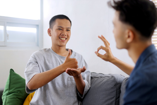 The Americans with Disabilities Act, adopted in 1990, helped usher in a wave of acceptance and new standards. But officials in states like North Dakota say there's still some outdated language used in public institutions that serve these populations. (Adobe Stock)