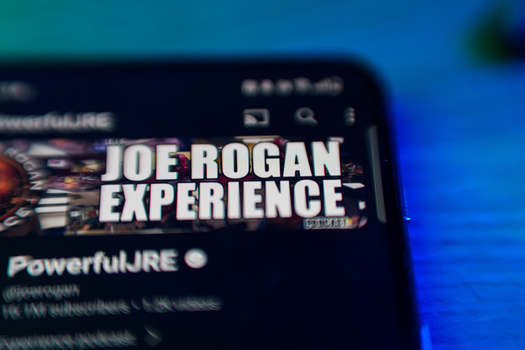 Comedians lobbing political jabs from a right perspective are gaining ground through popular podcasts such as the Joe Rogan Experience. (Adobe Stock)