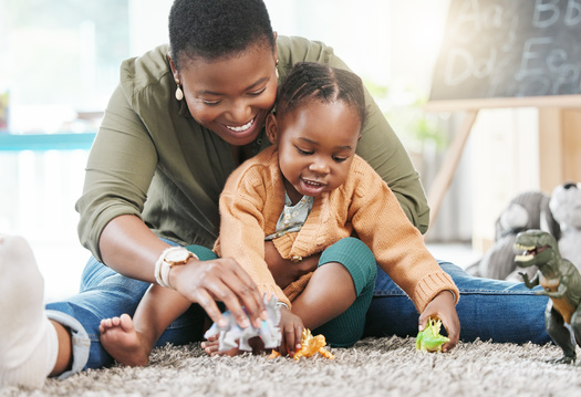 High prices and a high turnover rate of child care providers are not only affecting families but the state's economy. Census data show more than 15,000 people are not employed because they're caring for a child at home. (Adobe Stock) 