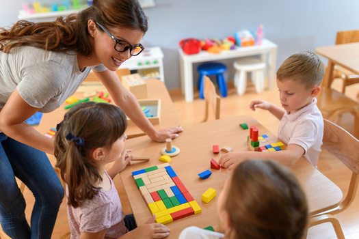 On average, child care providers make less than people who walk dogs for a living, according to Care for Kids. (Adobe Stock) 