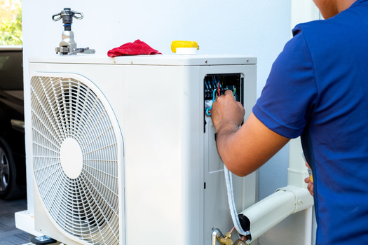 Funds from the Inflation Reduction Act are now flowing to help California families afford energy-efficient electric heat pumps. (Isengard/Adobe Stock)