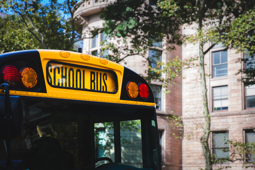 Support staff like school bus drivers help Washington state schools run. (teamjackson/Adobe Stock)